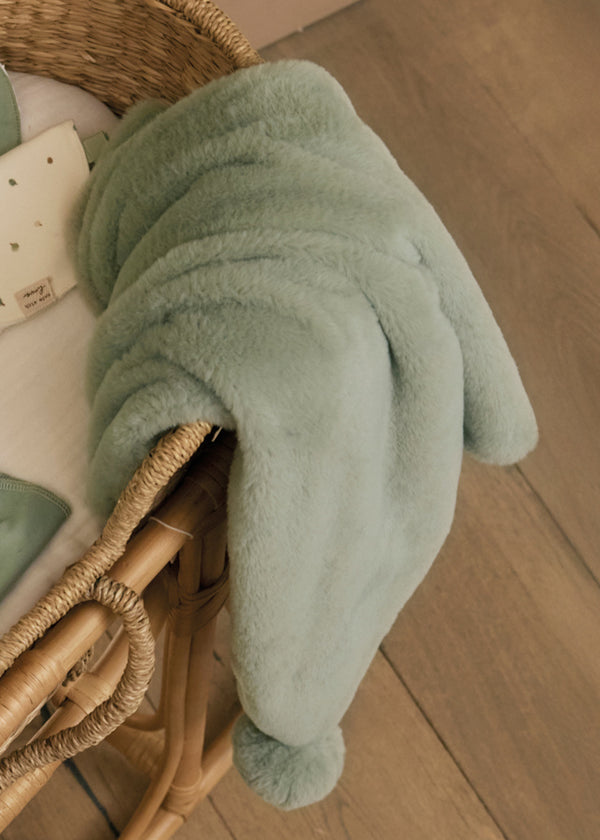 Manta para bebé con pom pom 995556